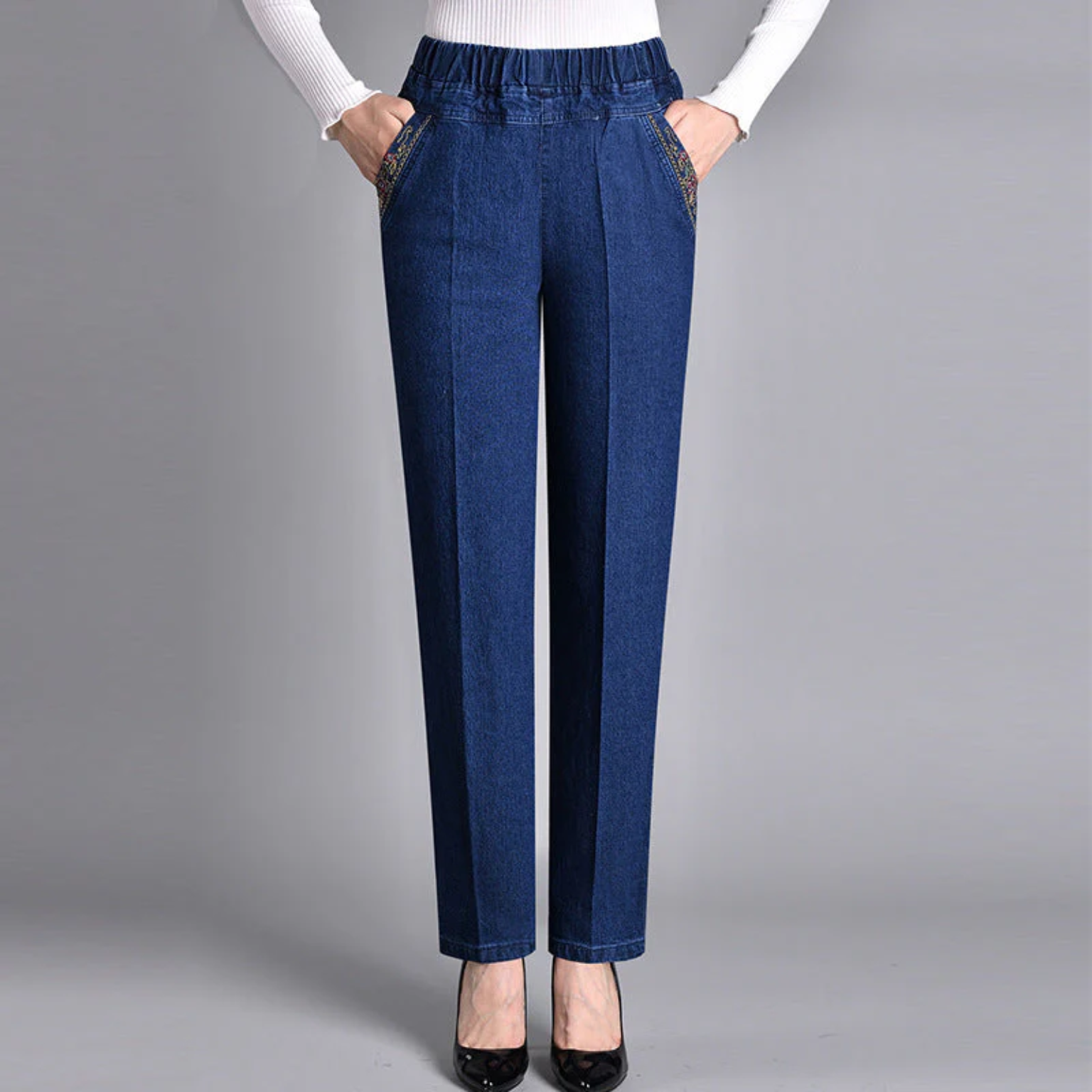 Damejeans med sidelommer og fuld elastisk linning